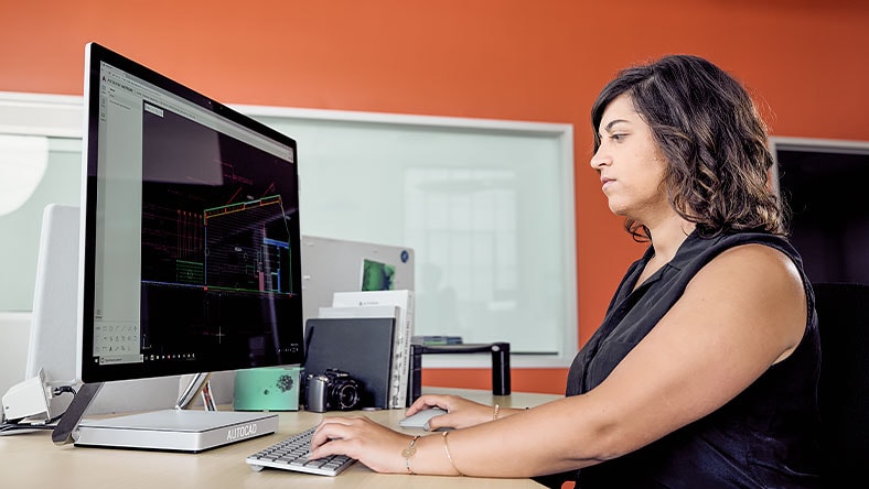 Architect working in front of a computer