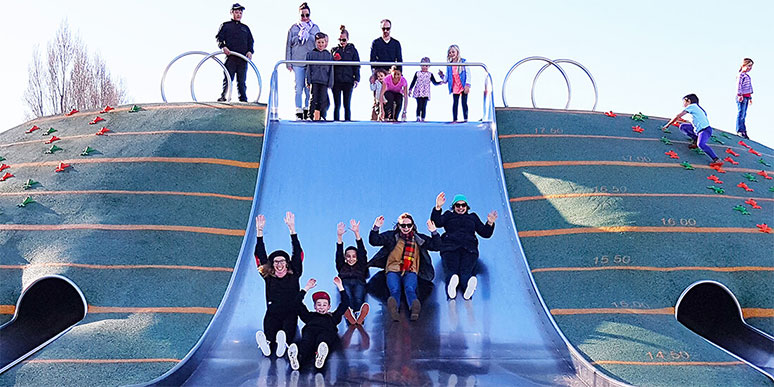 Children playing on a slide